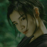 簡